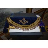 A BLUE VELVET GOLD THREAD AND WHITE MASONIC APRON