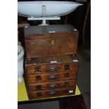 CHINESE FOUR DRAWER TABLE TOP CABINET AND A MAHOGANY AND BRASS INLAID TEA CADDY