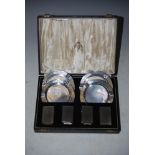 CASED SET OF FOUR BIRMINGHAM SILVER ENGINE TURNED ASH TRAYS AND MATCHING VESTA HOLDERS