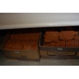 FOUR BOXES OF ASSORTED TERRACOTTA FLEUR DE LYS FORM TILES