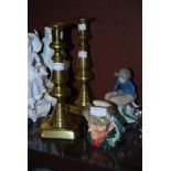 PAIR OF BRASS EJECTOR CANDLESTICKS, TOGETHER WITH A ROYAL DOULTON CHARACTER JUG 'THE POACHER', AND A