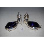 BIRMINGHAM SILVER FOUR PIECE CRUET SET COMPRISING PAIR OF PEPPER POTS, TWO OVAL SALT DISHES WITH