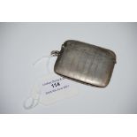 BIRMINGHAM SILVER VESTA HOLDER OF FLATTENED RECTANGULAR FORM WITH ENGINE TURNED DETAIL