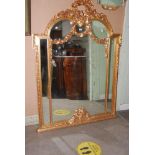 GEORGE III STYLE GILT WOOD OVER MANTEL MIRROR WITH RIBBON TIED SURMOUNT AND FLORAL GARLAND DETAIL