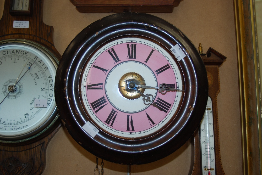 LATE 19TH CENTURY 'WAG AT THE WA' WALL CLOCK WITH CIRCULAR WHITE, PINK AND BLACK ROMAN NUMERAL DIAL