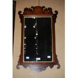 GEORGE II STYLE MAHOGANY FRET-CUT WALL MIRROR WITH RECTANGULAR BEVELLED MIRROR PLATE