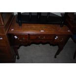 19TH CENTURY OAK LOW BOY WITH THREE FRIEZE DRAWERS ON TAPERED CABRIOLE SUPPORTS AND PAD FEET