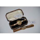 18CT GOLD CASED LADIES COCKTAIL WATCH WITH OVAL ARABIC NUMERAL ENGINE TURNED DIAL ON 9CT GOLD MESH
