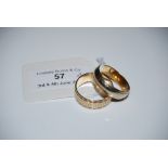 TWO 9CT GOLD RINGS. GROSS WEIGHT 7.1 GRAMS