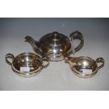 EDWARD VII THREE PIECE SILVER TEA SET, GLASGOW, 1917, MAKERS MARK OF R&WS, INSCRIBED ON THE BASE "