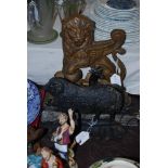 CAST METAL DOOR STOP IN THE FORM OF A WINGED LION, TO GO WITH ANOTHER IN THE FORM OF A SHEEP AND
