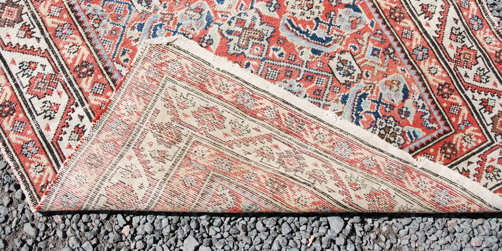 A Persian long rug and a Persian runner, the long rug with a blue rectangular field of stylised - Image 6 of 10