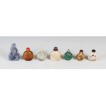 A collection of seven Chinese stone snuff bottles, Qing Dynasty and later, to include; a blue