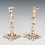 A pair of Edwardian silver candlesticks in the George III style, Birmingham, 1905, makers mark of