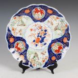 A Japanese Imari charger, late 19th/ early 20th century, decorated with peony and quail, 29cm