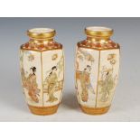 A pair of Japanese Satsuma pottery hexagonal shaped vases, Meiji Period, decorated with panels of