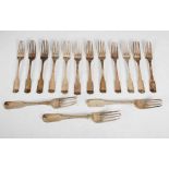A collection of George III Scottish silver flatware, comprising; nine fiddle pattern dessert