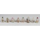 A collection of eight Chinese inside painted glass snuff bottles, Qing Dynasty and later, to