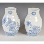 A pair of Japanese Hirado porcelain vases, Meiji Period, decorated with peony, 26.5cm high.