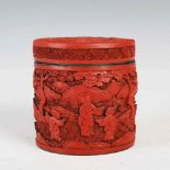 A Chinese cinnabar lacquer cylindrical box and cover, Qing Dynasty, the circular detachable cover