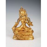 A Chinese gilt bronze figure of Buddha, Qing Dynasty, 16.5cm high.