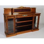 A late 19th century walnut, ebonised and gilt metal mounted inverted breakfront credenza, the