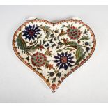 A late 19th/ early 20th century Zsolnay Pecs pottery heart-shaped tray, decorated with a Persian