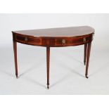 A 19th century mahogany and marquetry inlaid demi lune console table, the shaped top above a