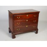 A 19th century mahogany chest, the rectangular top with moulded edge over three long graduated