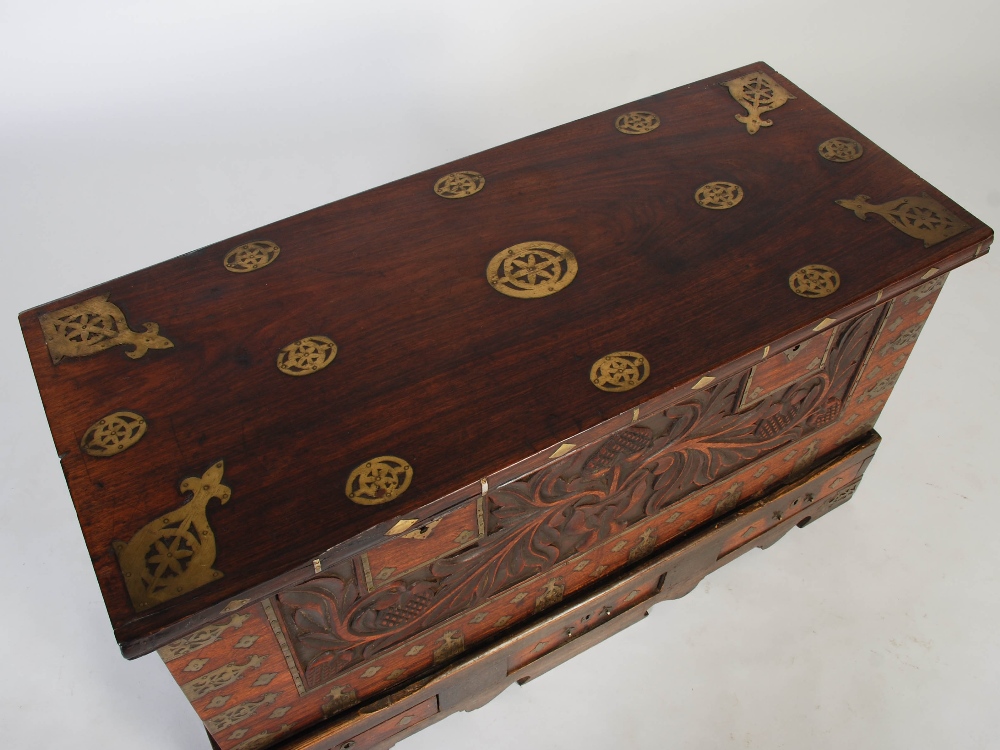 A 19th century Anglo-Indian brass bound chest on stand, the hinged rectangular top inlaid with - Image 4 of 7