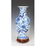 A Chinese porcelain blue and white dragon vase, Qing Dynasty bearing Qianlong seal mark, decorated