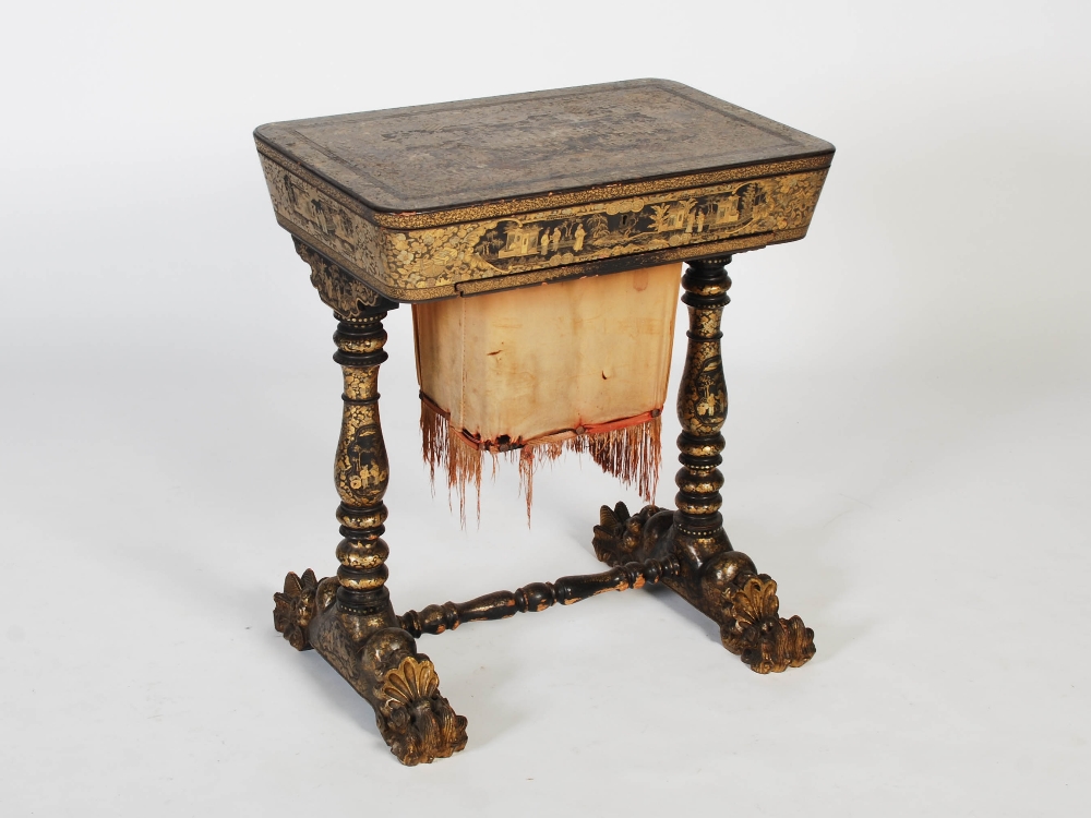 A 19th century Chinese export lacquer work table, the hinged rectangular top decorated with