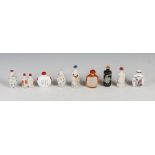 A collection of nine Chinese porcelain seal and character marked snuff bottles, Qing Dynasty and
