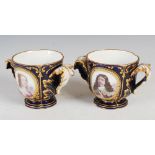 A pair of Sevres porcelain blue ground twin handled jardinieres, decorated with male and female