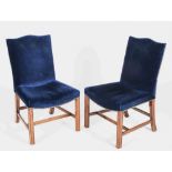 A pair of 20th century mahogany and blue velvet upholstered Gainsborough type side chairs, with