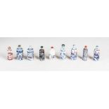 A collection of nine Chinese blue, white and copper red porcelain snuff bottles, to include; a