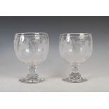 A pair of oversized 19th century glass goblets, the circular bowls engraved with wheat sheaves,