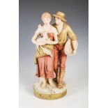 A Royal Dux figure group of shepherdess and lamb with attendant male, applied and impressed triangle
