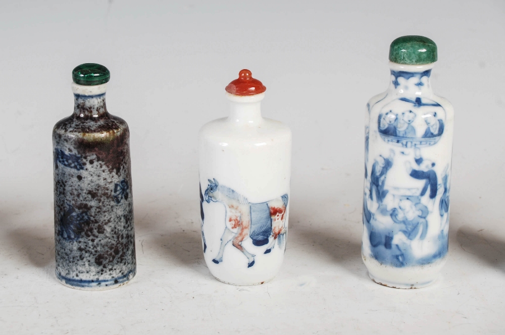 A collection of nine Chinese blue, white and copper red porcelain snuff bottles, to include; a - Image 3 of 4