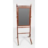 A 19th century mahogany and ebony lined cheval mirror, the rectangular bevelled mirror plate