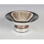 A 20th century Irish silver bowl, Dublin, 1976, of conical form on circular wooden plinth with