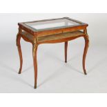 A late 19th century rosewood marquetry and gilt metal mounted bijouterie table, the shaped