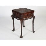 A Chinese dark wood envelope games table, late Qing Dynasty, the square revolving top with four