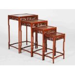 A quarteto of four Chinese occasional tables, 20th century, the rectangular panelled tops above