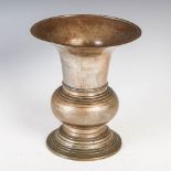 A silvered bronze vase, with horizontal line detail, 25.5cm high.