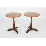 A pair of 19th century rosewood occasional tables, the circular tops raised on tapered cylindrical