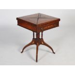 A late 19th century rosewood and marquetry inlaid envelope games table, the square revolving top