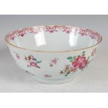 A Chinese porcelain famille rose footed bowl, Qing Dynasty, decorated with peony and other