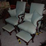 A pair of George III style mahogany shepherd's crook armchairs