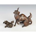 A Chinese bronze Kylin incense burner, Qing Dynasty, modelled crouching with front left leg